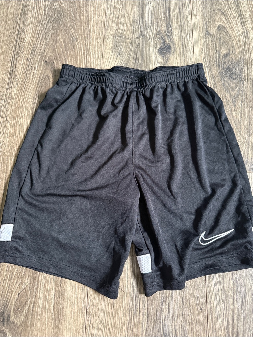 Nike Boys Black Athletic Shorts with White Swoosh